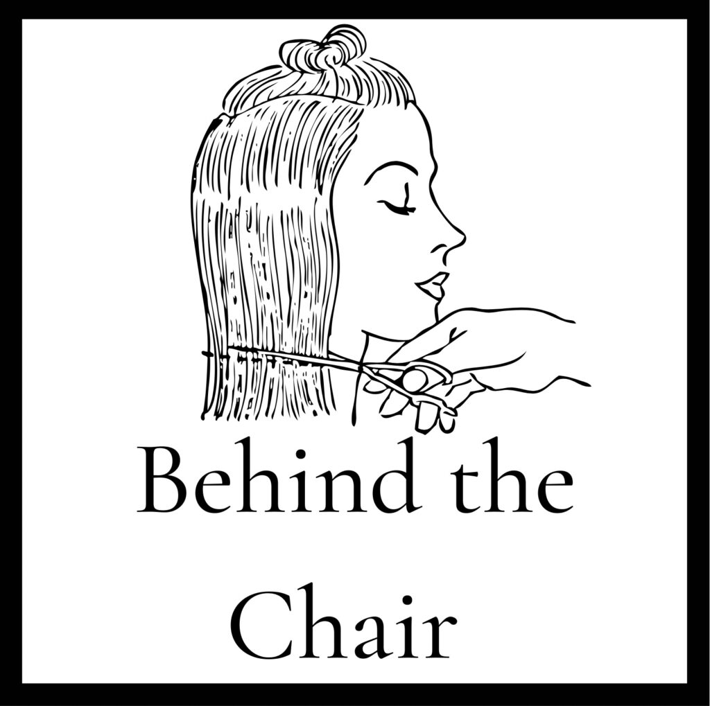 behind the chair confident cosmetologist